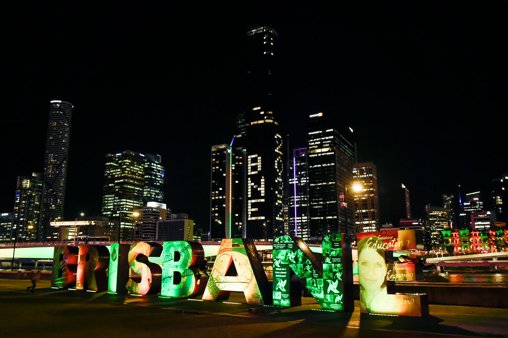 BRISBANE, AUSTRALIA - JULY 21: A general view is seen as "BNE 2032" is displayed on a building during the announcement of the host city for the 2032 Olympic Games, watched via live feed in Tokyo, at the Brisbane Olympic Live Site on July 21, 2021 in Brisbane, Australia. (Photo by Albert Perez/Getty Images)