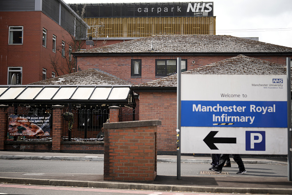 MANCHESTER, ENGLAND - APRIL 14: Car parking signs are displayed at Manchester Royal Infirmary on April 14, 2022 in Manchester, England. Free parking in hospital car parks for NHS staff was introduced by the government in July 2020 during the pandemic but ended on March 31, 2022. (Photo by Christopher Furlong/Getty Images)