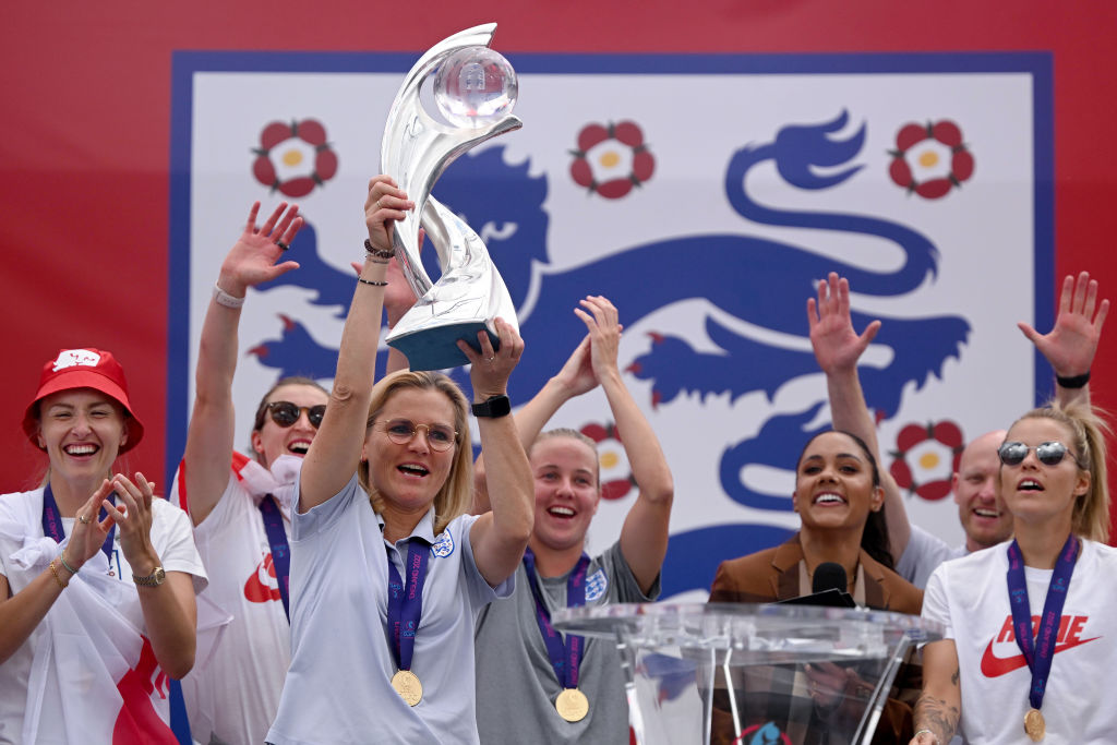 Sarina Wiegman, Manager of England lifts the UEFA Women’s EURO 2022 Trophy during the England Women's Team Celebration at Trafalgar Square on August 01, 2022 in London, England. The England Women's Football team beat Germany 2-1 in the Final of The UEFA European Women's Championship last night at Wembley Stadium.  (Photo by Leon Neal/Getty Images)