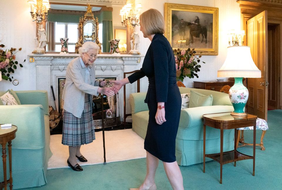 Queen Elizabeth greets newly elected leader of the Conservative party Liz Truss as she arrives at Balmoral Castle for an audience where she will be invited to become Prime Minister and form a new government (Photo by Jane Barlow – WPA Pool/Getty Images)