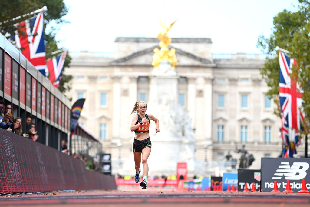 LONDON, ENGLAND - OCTOBER 03: Charlotte Purdue of Great Britain makes their way towards the finish line in the Women's Elite Race during the 2021 Virgin Money London Marathon at Tower Bridge on October 03, 2021 in London, England. (Photo by Alex Davidson/Getty Images)