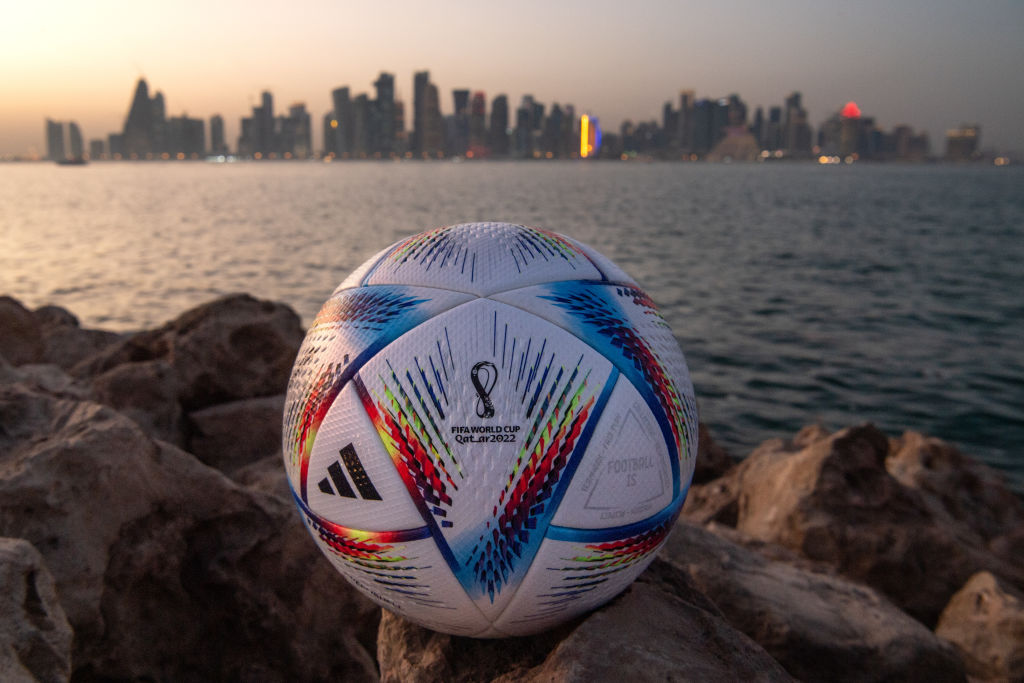 An official FIFA World Cup Qatar 2022 ball sits on display in front of the skyline of Doha ahead of the FIFA World Cup, which kicks off this Sunday