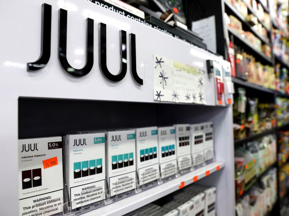 Packages of Juul e-cigarettes are displayed for sale. (Photo by Mario Tama/Getty Images)