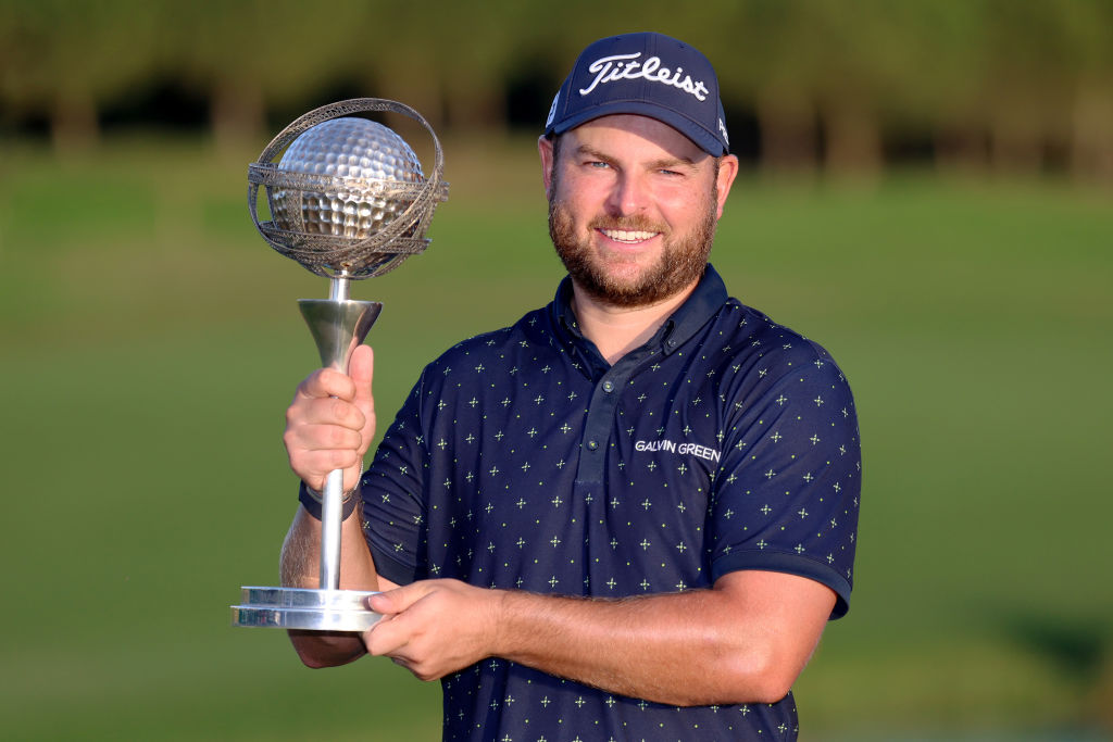 QUARTEIRA, PORTUGAL - OCTOBER 30: Jordan Smith of England poses for a photograph with the trophy after winning the Portugal Masters during Day Four of the Portugal Masters at Dom Pedro Victoria Golf Course on October 30, 2022 in Quarteira, Portugal. (Photo by Warren Little/Getty Images)