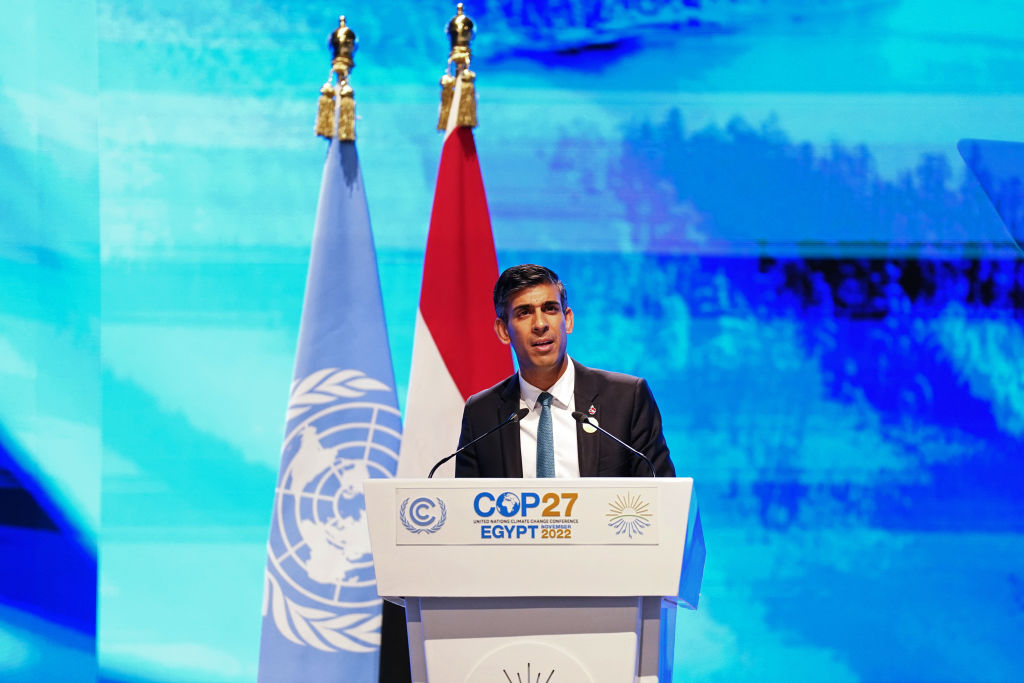SHARM EL SHEIKH, EGYPT - NOVEMBER 07: British Prime Minister Rishi Sunak addresses delegates during the UNFCCC COP 27 climate conference on November 7, 2022 in Sharm El Sheikh, Egypt. The conference is bringing together political leaders and representatives from 190 countries to discuss climate-related topics including climate change adaptation, climate finance, decarbonisation, agriculture and biodiversity. The conference is running from November 6-18. (Photo by Stefan Rousseau - Pool/Getty Images)
