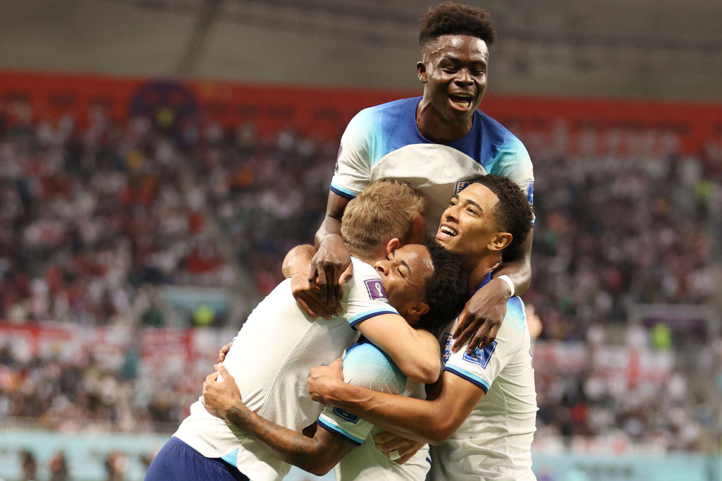 Saka (top) scored twice and Bellingham (right) shone as England thrashed Iran at the World Cup
