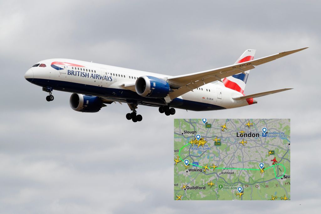 A British Airways flight, and the map of the U-turn (Photo by Adrian DENNIS / AFP) (Photo by ADRIAN DENNIS/AFP via Getty Images)