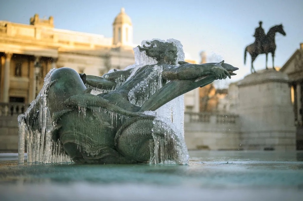 Icicles hang from a statue in the fountains of Trafalgar Square as sub-zero temperatures hit London.
