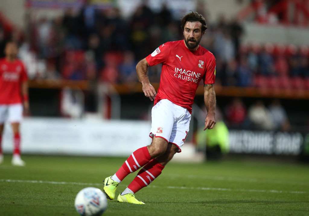 SWINDON, ENGLAND - AUGUST 20:  Michael Doughty of Swindon Town in action during the Sky Bet League Two match between Swindon Town and Northampton Town at The County Ground on August 20, 2019 in Swindon, England. (Photo by Pete Norton/Getty Images)