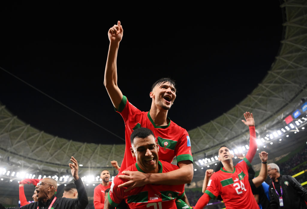 DOHA, QATAR - DECEMBER 10: Achraf Dari and Walid Cheddira of Morocco celebrate after the 1-0 win during the FIFA World Cup Qatar 2022 quarter final match between Morocco and Portugal at Al Thumama Stadium on December 10, 2022 in Doha, Qatar. (Photo by Justin Setterfield/Getty Images)
