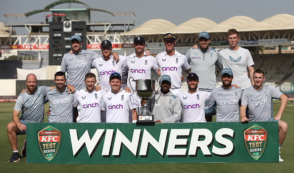 The England Test cricket team with their winning trophy