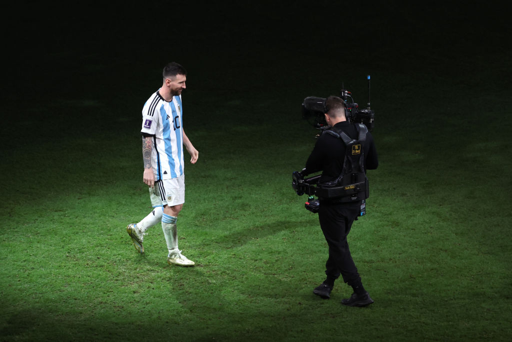 Messi alone as he prepares to lift the FIFA World Cup in what was one of the year's biggest sporting moments