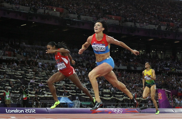 Natalya Antyukh crossing the line at London 2012