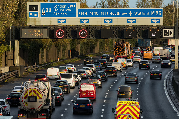 Vehicles are pictured queueing on the M25.(photo by Mark Kerrison/In Pictures via Getty Images)