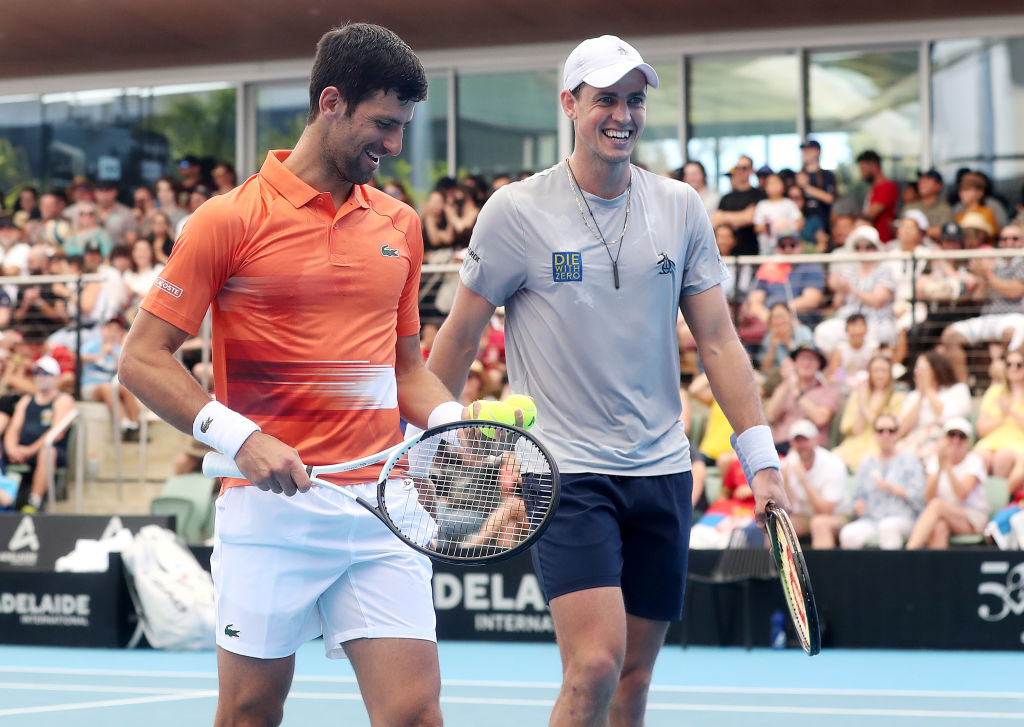 Djokovic (left) and Pospisil lost in the doubles at the Adelaide International in Australia