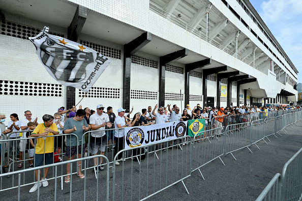 Fans queued overnight to see Pele's coffin at the Vila Belmiro stadium