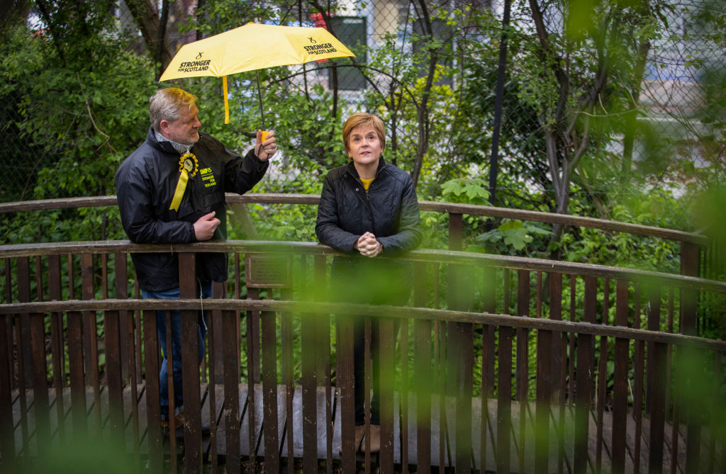 Nicola Sturgeon with Edinburgh Central candidate Angus Robertson  on the campaign trail in 2021. (Photo by Jane Barlow - Pool/Getty Images)