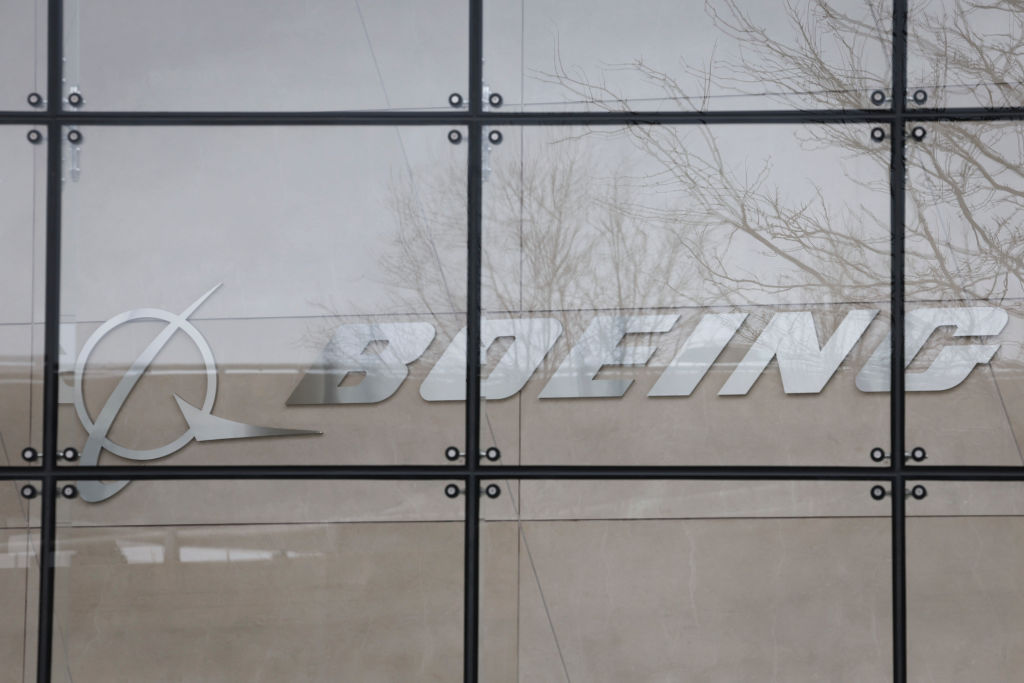 Boeing expects to cut about 2,000 white-collar jobs this year in finance and human resources through a combination of attrition and layoffs, the U.S. plane maker confirmed Monday.(Photo by Win McNamee/Getty Images)