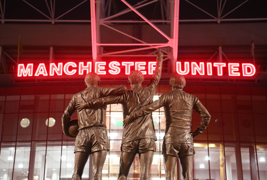 MANCHESTER, ENGLAND - FEBRUARY 08: A general view of the Trinity Statue on the outside of the stadium of Sir Bobby Charlton, George Best and Denis Law prior to the Premier League match between Manchester United and Leeds United at Old Trafford on February 08, 2023 in Manchester, England. (Photo by Michael Regan/Getty Images)
