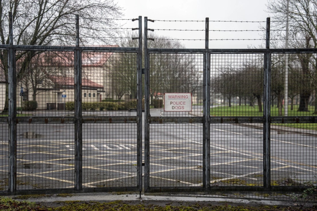 A gate on the perimeter fence of MDP Wethersfield, a former Royal Air Force base, is pictured on March 9, 2023 in Wethersfield, England. Braintree District Council has been approached by the government to discuss using the former RAF/USAF base as accommodation for asylum seekers. (Photo by Carl Court/Getty Images)