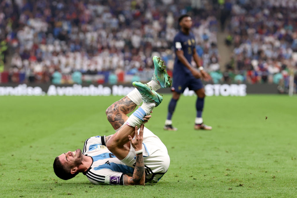 LUSAIL CITY, QATAR - DECEMBER 18: Rodrigo De Paul of Argentina goes down with an injury during the FIFA World Cup Qatar 2022 Final match between Argentina and France at Lusail Stadium on December 18, 2022 in Lusail City, Qatar. (Photo by Julian Finney/Getty Images)