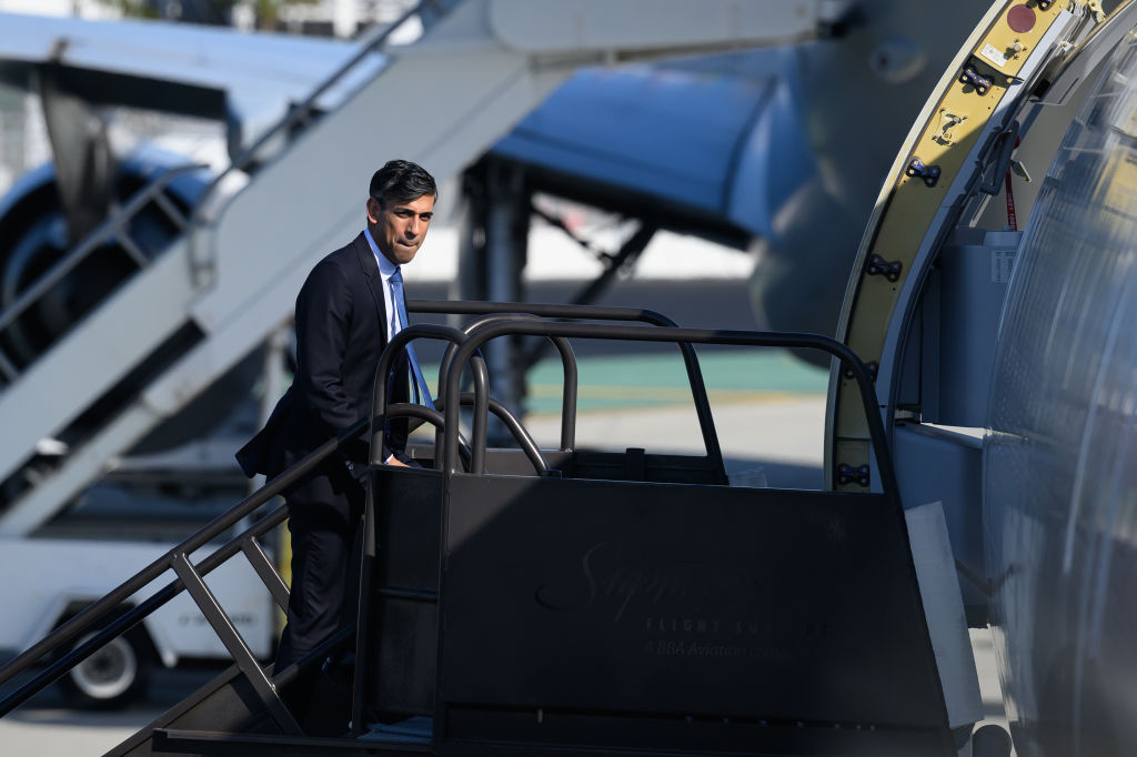 Prime Minister Rishi Sunak boards his plane at the end of his visit for the AUKUS summit. He has been courting countries outside the EU in a post-Brexit charm offensive  (Photo by Leon Neal/Getty Images)