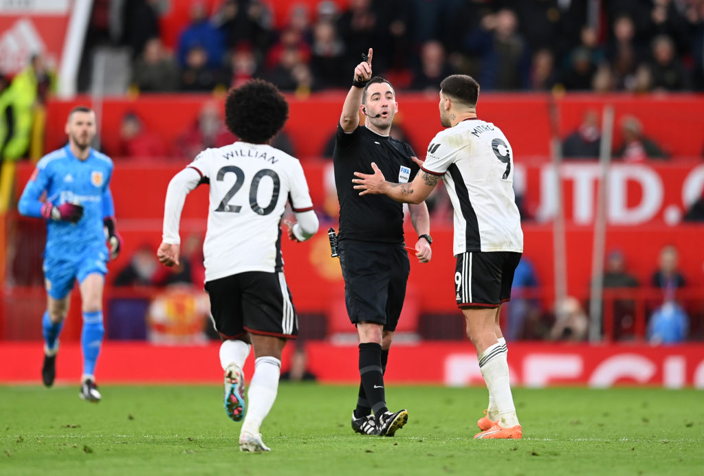 Fulham received three red cards in 40 seconds at Manchester United, including one for Mitrovic manhandling referee Chris Kavanagh