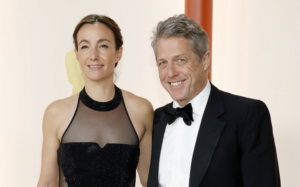 Hugh Grant's awkward Oscars red carpet interview is going viral