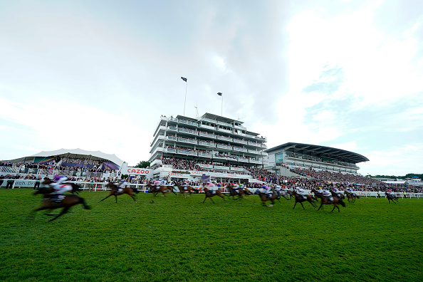 EPSOM, ENGLAND - JUNE 04: A general view as runners pass the grandstands after he finish of The Simpex Express 'Dash' Handicap during Cazoo Derby Day meeting at Epsom Racecourse on June 04, 2022 in Epsom, England. (Photo by Alan Crowhurst/Getty Images)