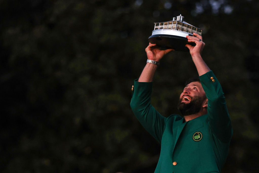 AUGUSTA, GEORGIA - APRIL 09: Jon Rahm of Spain celebrates with the Masters trophy during the Green Jacket Ceremony after winning the 2023 Masters Tournament at Augusta National Golf Club on April 9, 2023 in Augusta, Georgia. (Photo by Patrick Smith/Getty Images)