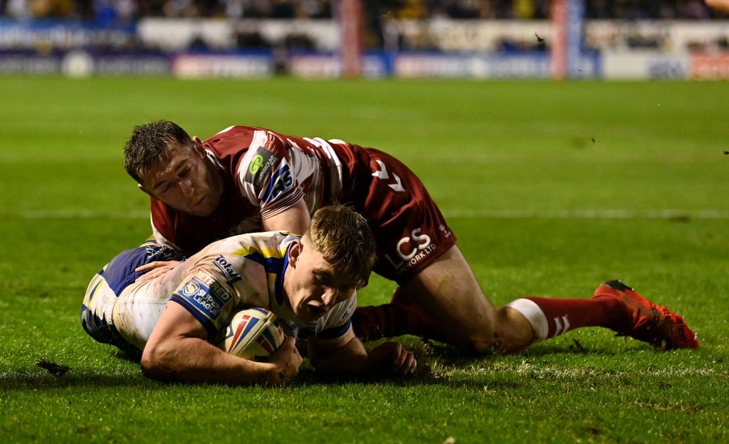WARRINGTON, ENGLAND - APRIL 14: Matt Nicholson of Warrington scores his team's opening try during the Betfred Super League between Warrington Wolves and Wigan Warriors at The Halliwell Jones Stadium on April 14, 2023 in Warrington, England. (Photo by Gareth Copley/Getty Images)