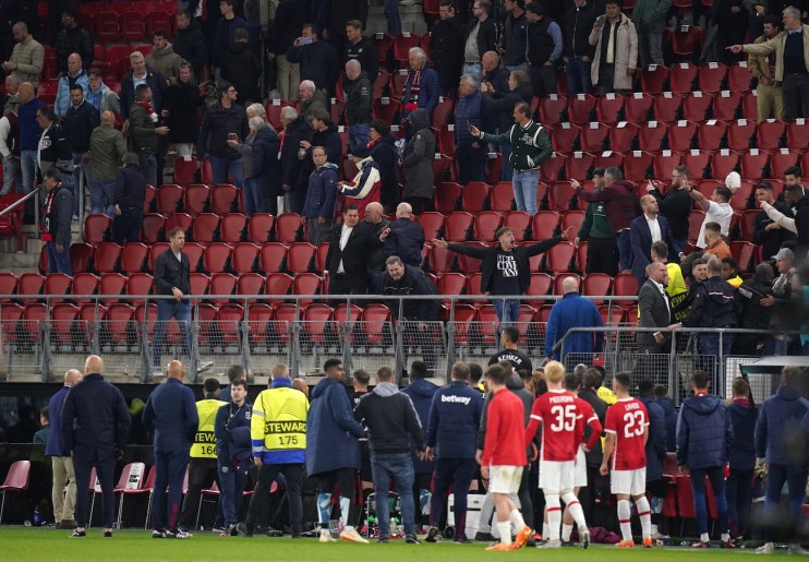 Fans clashing after the UEFA Europa Conference League semi-final at the AFAS Stadium, Alkmaar. UEFA is expected to launch an investigation into the trouble that marred West Ham&rsquo;s Europa Conference League semi-final victory at AZ Alkmaar. Issue date: Friday May 19, 2023. PA Photo. See PA story SOCCER West Ham Disciplinary. Photo credit should read Adam Davy/PA Wire.