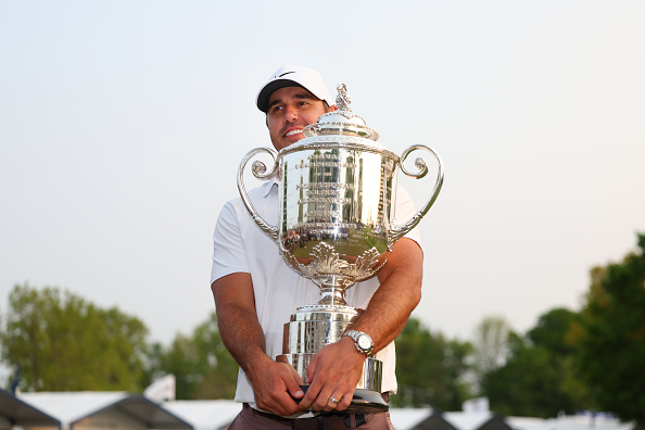 ROCHESTER, NEW YORK - MAY 21: Brooks Koepka of the United States celebrates with the Wanamaker Trophy after winning the 2023 PGA Championship at Oak Hill Country Club on May 21, 2023 in Rochester, New York. (Photo by Andrew Redington/Getty Images)