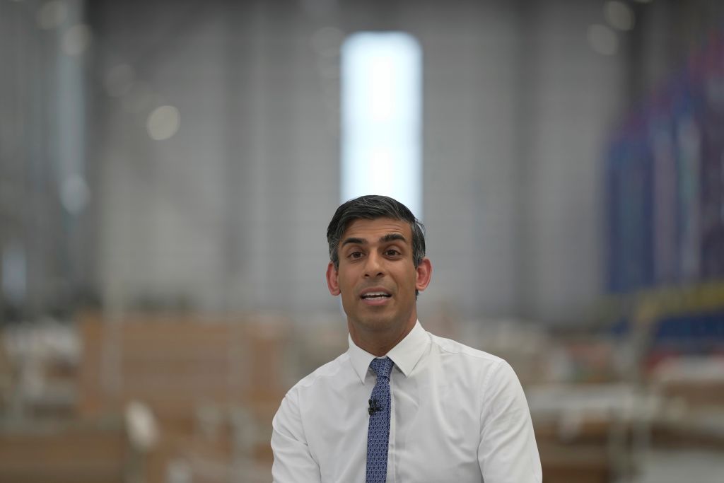 Prime Minister Rishi Sunak has announced a "landmark agreement" which will see the UK government test the safety of new AI models before they are released. (Photo by Kin Cheung - WPA Pool/Getty Images)