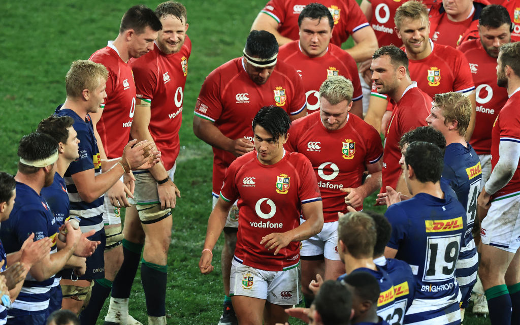 CAPE TOWN, SOUTH AFRICA - JULY 17: Marcus Smith of the British & Irish Lions leads the Lions off the pitch after their victory during the match between the DHL Stormers and the British & Irish Lions at Cape Town Stadium on July 17, 2021 in Cape Town, South Africa. (Photo by David Rogers/Getty Images)