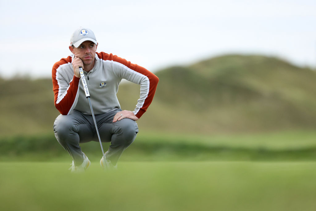 KOHLER, WISCONSIN - SEPTEMBER 25: Rory McIlroy of Northern Ireland and team Europe lines up a putt during Saturday Afternoon Fourball Matches of the 43rd Ryder Cup at Whistling Straits on September 25, 2021 in Kohler, Wisconsin. (Photo by Patrick Smith/Getty Images)