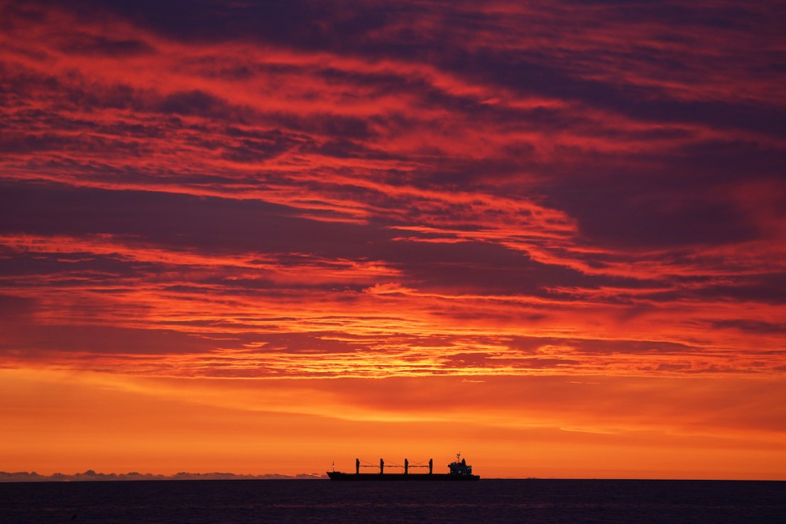 A ship on the North Sea off the coast of Tynemouth during sunrise. Picture date: Friday September 1, 2023. PA Photo. Photo credit should read: Owen Humphreys/PA Wire