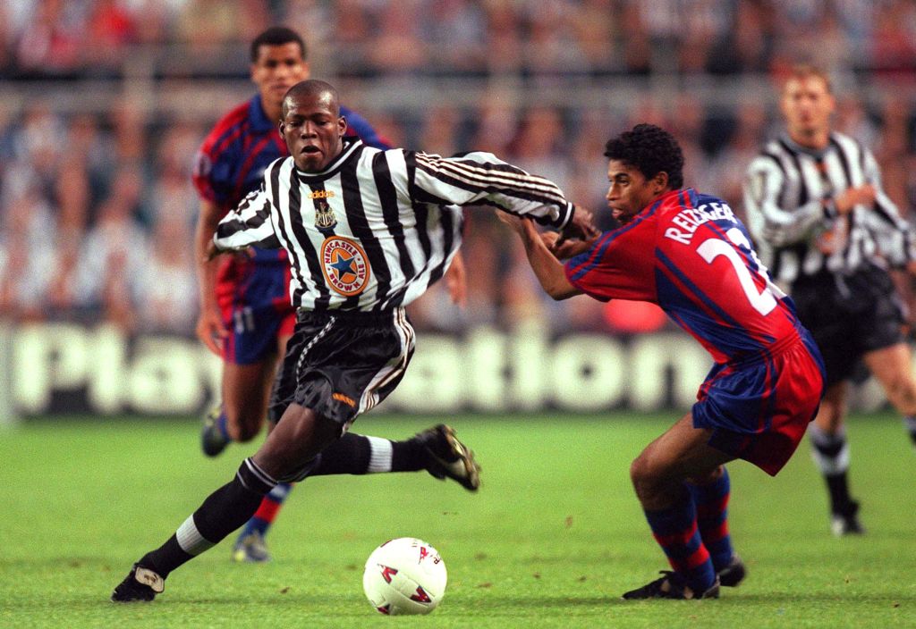 17/9/1997 UEFA Champions League 1997/98, Newcastle United v Barcelona. Faustino Asprilla shrugs off Michael Reiziger. (Photo by Mark Leech/Offside via Getty Images)