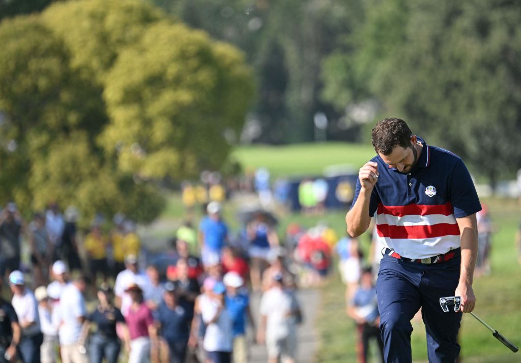 US golfer, Patrick Cantlay walks onto the 15th green during his singles match against Europe's English golfer, Justin Rose on the final day of play in the 44th Ryder Cup at the Marco Simone Golf and Country Club in Rome on October 1, 2023. (Photo by Alberto PIZZOLI / AFP) (Photo by ALBERTO PIZZOLI/AFP via Getty Images)