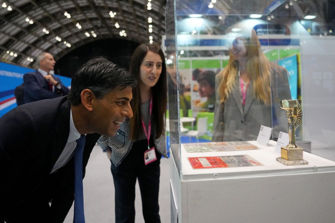 MANCHESTER, ENGLAND - OCTOBER 3: British Prime Minister Rishi Sunak looks at an exhibit as he tours the Exhibitor's Hall on Day 3 of the Conservative Party Conference on October 3, 2023 in Manchester, England. Conservative Party Conference is being held in Manchester this year and sees Rishi Sunak address party members as leader of the party for the first time. (Photo by Carl Court/Getty Images)