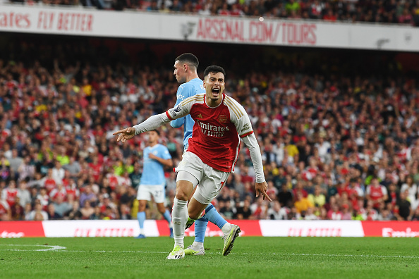 LONDON, ENGLAND - OCTOBER 08: Gabriel Martinelli of Arsenal celebrates after scoring their sides first goal during the Premier League match between Arsenal FC and Manchester City at Emirates Stadium on October 08, 2023 in London, England. (Photo by Stuart MacFarlane/Arsenal FC via Getty Images)