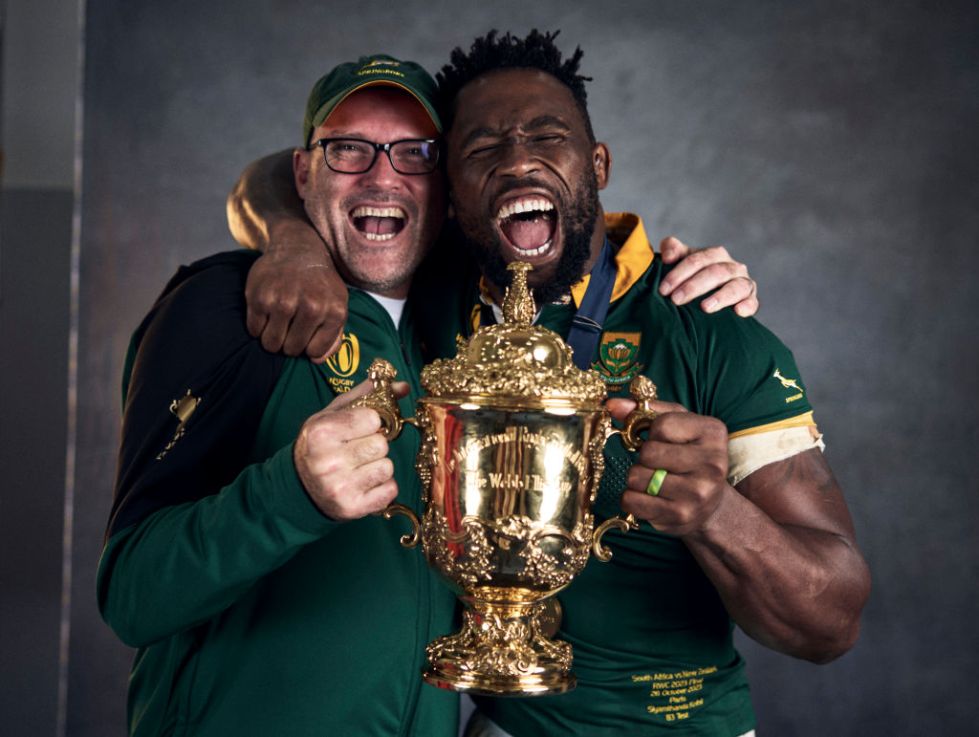 PARIS, FRANCE - OCTOBER 29: Jacques Nienaber, Head Coach of South Africa and Siya Kolisi of South Africa pose with the Webb Ellis Cup during the South Africa Winners Portrait shoot after the Rugby World Cup Final match between New Zealand and South Africa at Stade de France on October 29, 2023 in Paris, France. (Photo by Adam Pretty - World Rugby/World Rugby via Getty Images)