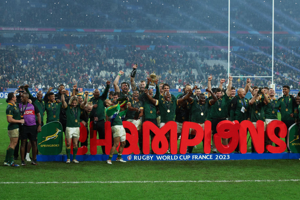 PARIS, FRANCE - OCTOBER 28:  South Africa players and staff celebrate with the Webb Ellis Cup after winning the Rugby World Cup France 2023 Gold Final match between New Zealand and South Africa at Stade de France on October 28, 2023 in Paris, France. (Photo by Craig Mercer/MB Media/Getty Images)