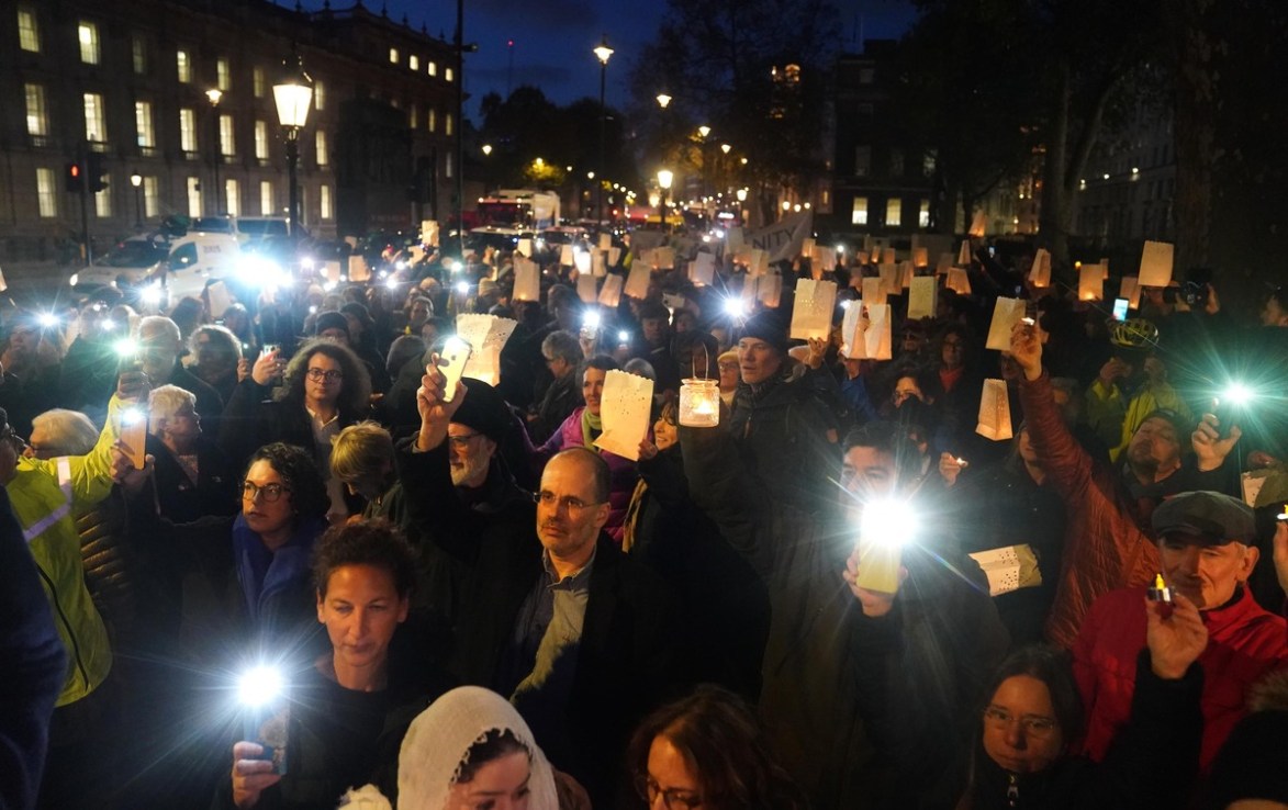 People at a vigil for civilians in Israel and Palestine, in Westminster. Photo: PA