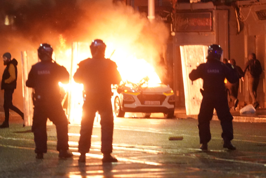 Buses and trams have been torched and a shop looted during riots in Dublin city centre after a woman and three young children were injured in a knife attack near a school. Photo: PA