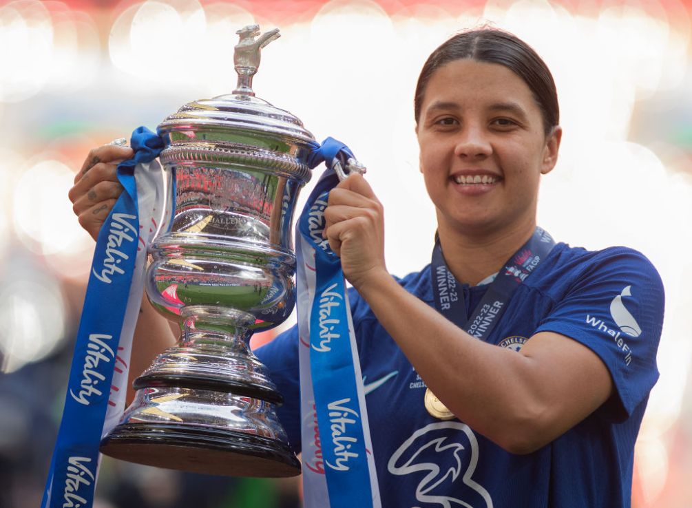 LONDON, ENGLAND - MAY 14:  Sam Kerr of Chelsea holds up the FA Cup after the Vitality Women's FA Cup Final between Chelsea FC and Manchester United at Wembley Stadium on May 14, 2023 in London, England. (Photo by Visionhaus/Getty Images)