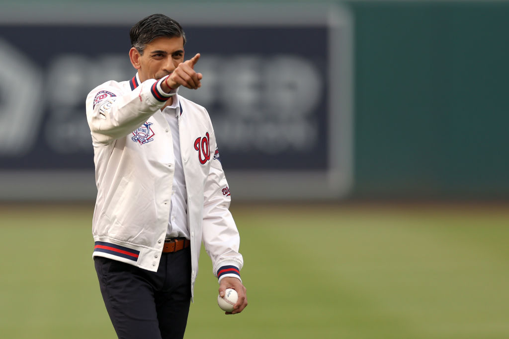 WASHINGTON, DC - JUNE 07: UK Prime Minister Rishi Sunak  waves to the crowd after being introduced before the start of the Washington Nationals and Arizona Diamondbacks game at Nationals Park on June 07, 2023 in Washington, DC. (Photo by Rob Carr/Getty Images)