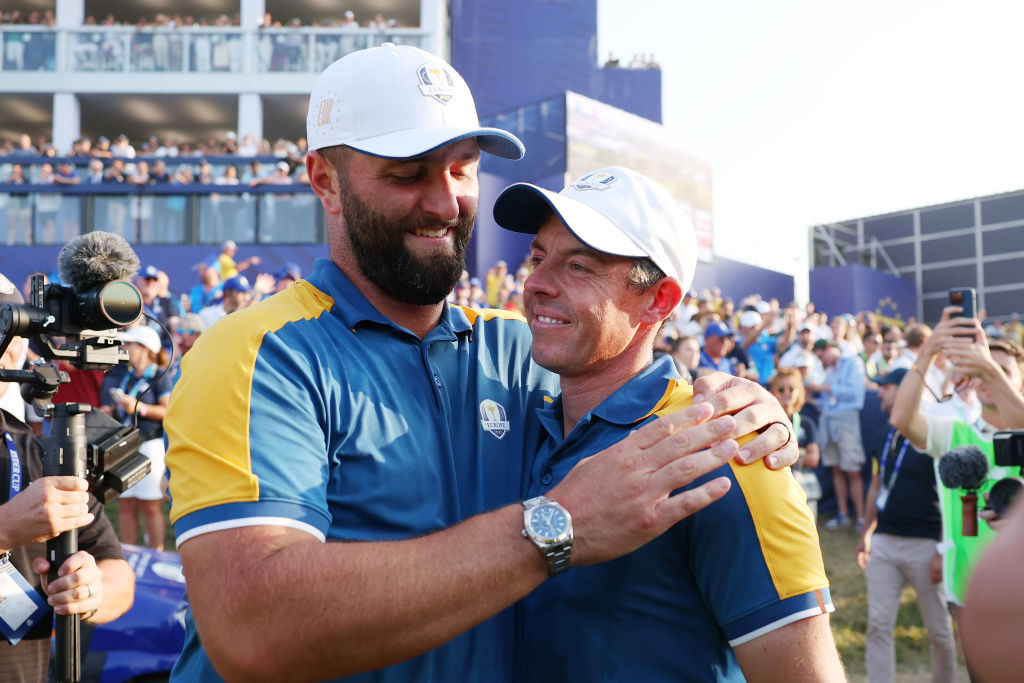 ROME, ITALY - OCTOBER 01: Rory McIlroy and Jon Rahm of Team Europe celebrate following victory with 16 and a half to 11 and a half win following the Sunday singles matches of the 2023 Ryder Cup at Marco Simone Golf Club on October 01, 2023 in Rome, Italy. (Photo by Patrick Smith/Getty Images)