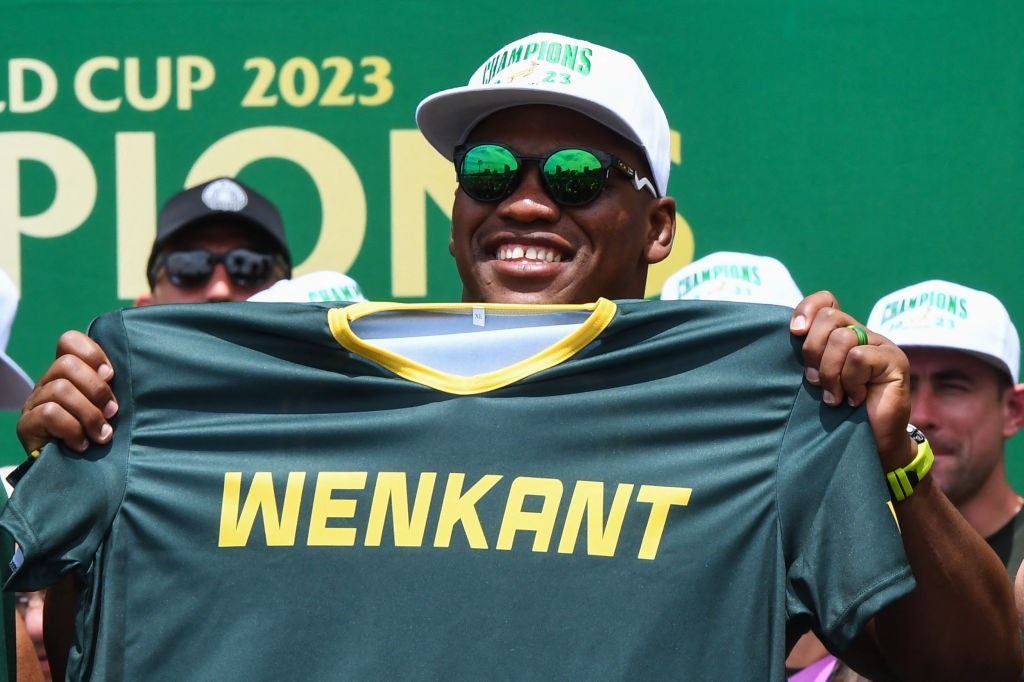 TOPSHOT - South Africa's hooker Bongi Mbonambi holds a shirt which translates "winning side" during the Springboks Champions trophy tour in Cape Town on November 3, 2023, after South Africa won the France 2023 Rugby World Cup final match against New Zealand. (Photo by Rodger Bosch / AFP) (Photo by RODGER BOSCH/AFP via Getty Images)
