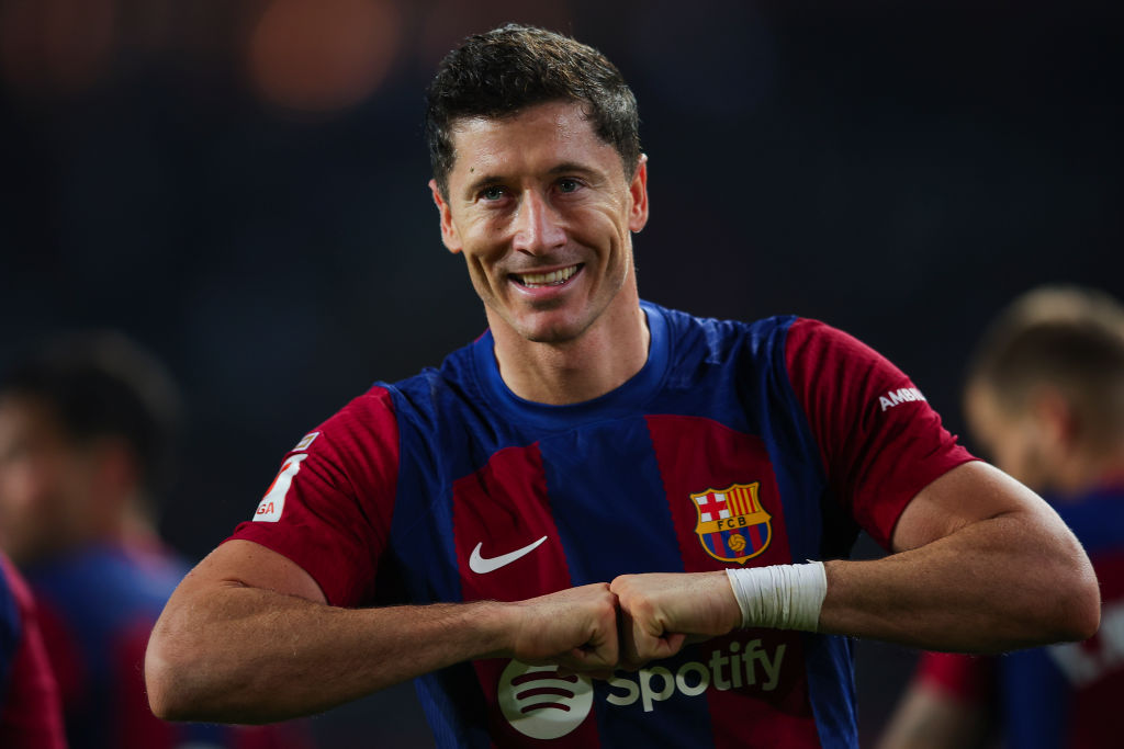 BARCELONA, SPAIN - NOVEMBER 12: Robert Lewandowski of FC Barcelona celebrates after scoring the team's second goal during the LaLiga EA Sports match between FC Barcelona and Deportivo Alaves at Estadi Olimpic Lluis Companys on November 12, 2023 in Barcelona, Spain. (Photo by Eric Alonso/Getty Images)